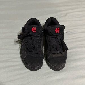 Size 8.5 men’s Etnies sneakers. Red, white, and blue. Metal Militia design.